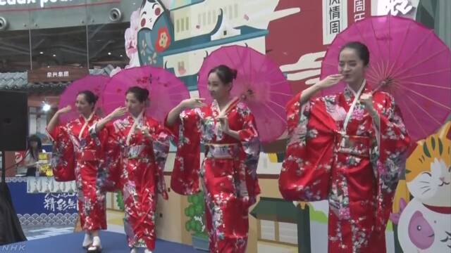 中国の広州で日本の観光と食べ物を紹介するイベント